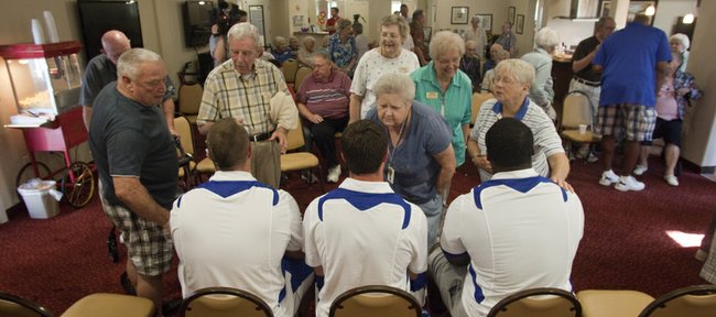 Three Kansas University football players were on hand at the Meadowlark Estates Retirement Home on Wednesday, July 10, 2013, to discuss the upcoming season with residents.