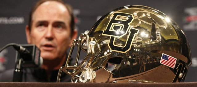 Baylor football coach Art Briles answers questions from the media during the NCAA college Big 12 Conference Football Media Days Tuesday, July 23, 2013 in Dallas.