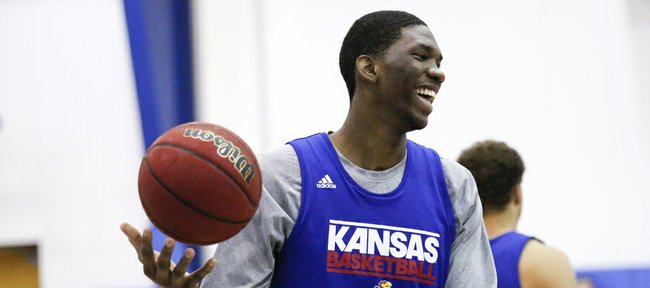 Kansas center Joel Embiid laughs during warmups before a scrimmage on Wednesday, June 12, 2013 at the Horejsi Center.