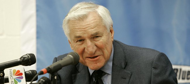 This Dec. 8, 2006 file photo shows former North Carolina basketball coach Dean Smith speaking during a news conference in Chapel Hill, N.C. President Barack Obama will bestow the nation’s highest civilian honor, the Presidential Medal of Freedom, on Smith and several others later this year.