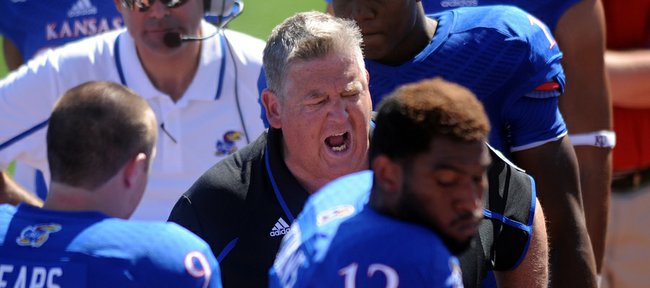 Charlie Weis gives his team some not so kind words before halftime on Saturday, Sept 21, 2013.