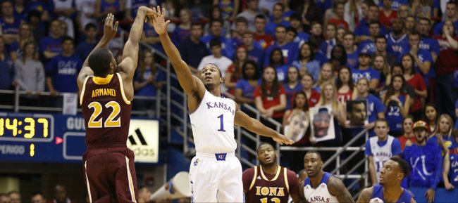 Kansas guard Wayne Selden guards a three by Iona guard Sean Armand during the first half on Tuesday, Nov. 19, 2013 at Allen Fieldhouse.