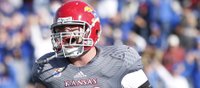 Opinion: Future fireman Spencer fights off defenders, injuries to make impact for KU
