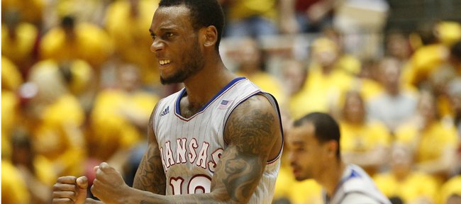 Kansas point guard Naadir Tharpe pumps his fist after forcing an Iowa State timeout during a Jayhawk run in the second half on Monday, Jan. 13, 2014 at Hilton Coliseum in Ames, Iowa.