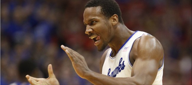 Kansas guard Wayne Selden gets pumped after a Jayhawk dunk against Oklahoma State during the first half on Saturday, Jan. 18, 2014 at Allen Fieldhouse.