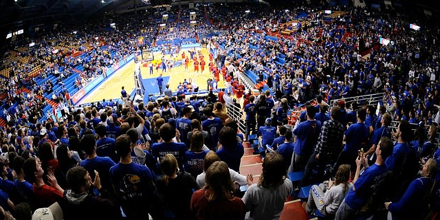 Kansas fans come to their feet in the north end zone of Allen Fieldhouse as the Jayhawks leave the court following warmups in preparation for tipoff against Alcorn State on Dec. 2, 2009.