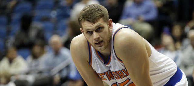 The Knicks’ Cole Aldrich takes a breather in New York’s game against the Timberwolves in this photo from March 5 in Minneapolis.