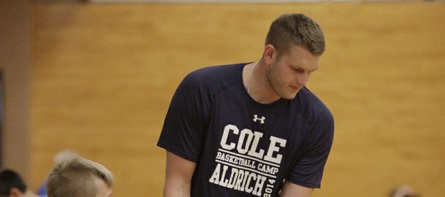 Former KU basketball player and current NBA player Cole Aldrich greets campers at his basketball camp Monday, July 7, 2014, at Robinson Gym at KU.