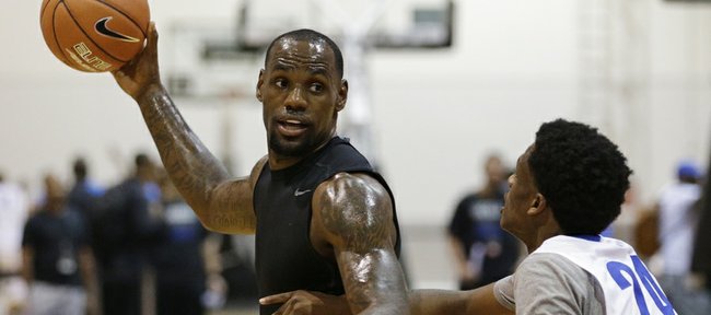 NBA star LeBron James plays basketball with high school athletes during the LeBron James Skills Academy on Wednesday, July 9, 2014, in Las Vegas. College athletes, including Kansas University’s Perry Ellis and Kelly Oubre, were also invited to the camp.