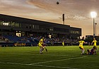 Kansas opened its 2014 soccer season against Wyoming under the lights at its new home at Rock Chalk Park on Friday, Aug. 22, 2014. 
