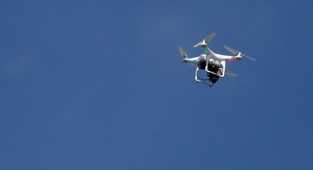 Before kickoff of the Kansas University football game against Texas, an unauthorized drone helicopter with a camera attached was seen flying over Memorial Stadium, Saturday, Sept. 27, 2014.