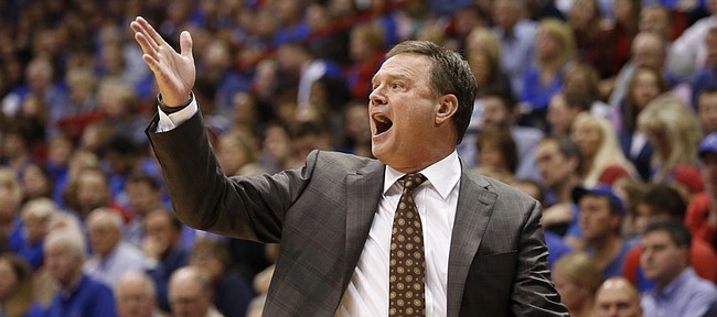 Kansas head coach Bill Self calls a play during the second half on Friday, Nov. 14, 2014 at Allen Fieldhouse.