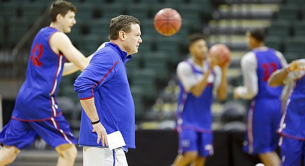 Kansas head coach Bill Self watches over practice as the Jayhawks get warmed up on Wednesday, Nov. 26, 2014 at the HP Fieldhouse in Kissimmee, Florida.