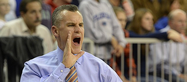 Florida coach Billy Donovan calls out instructions for the sidelines during the second half of NCAA College basketball against William & Mary in Gainesville, Fla., Friday, Nov., 14, 2014. Florida defeated William & Mary 68-45. (AP Photo/Phil Sandlin)
