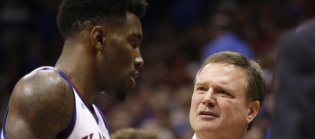Kansas head coach Bill Self questions a play by Jamari Traylor during a timeout in the second half, Friday, Nov. 14, 2014 at Allen Fieldhouse.