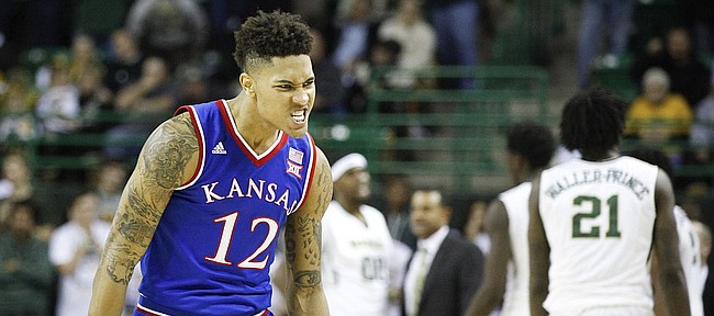 Kansas guard Kelly Oubre Jr. (12) casts a menacing glare after forcing a Baylor turnover on an inbound play with seconds remaining in the game on Wednesday, Jan. 7, 2014 at Ferrell Center in Waco, Texas.