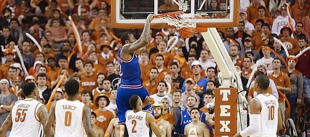 Kansas forward Cliff Alexander (2) delivers a dunk against the Texas zone defense late in the second half, Saturday, Jan. 24, 2015 at Frank Erwin Center in Austin, Texas.