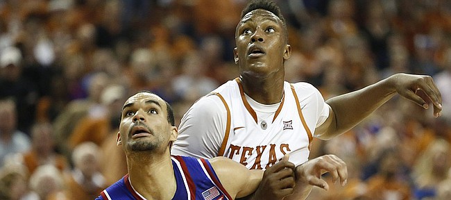Kansas forward Perry Ellis (34) boxes out Texas forward Myles Turner during the second half, Saturday, Jan. 24, 2015 at Frank Erwin Center in Austin, Texas.