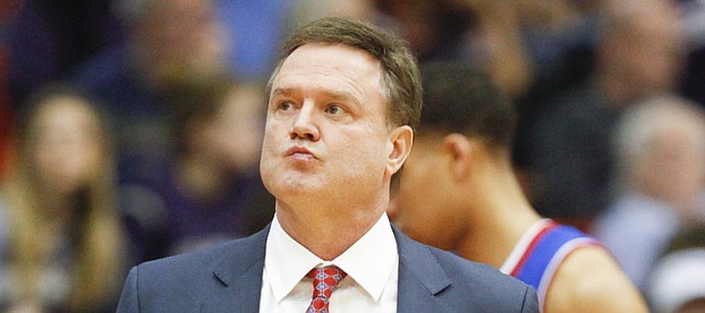Kansas head coach Bill Self glances at the scoreboard during a timeout late in the second half at Wilkerson-Greines Activity Center on Wednesday, Jan. 28, 2015 in Fort Worth, Texas.