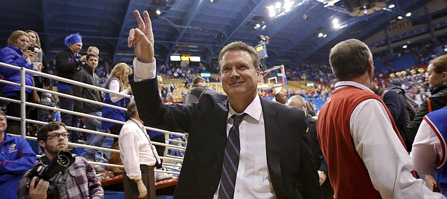 Kansas head coach Bill Self grins as he waves to the fans following the Jayhawks' 89-76 win over Iowa State on Monday, Feb. 2, 2015 at Allen Fieldhouse.