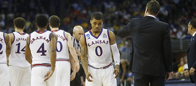 Kansas guard Frank Mason III (0) walks off the court after fouling out in the Jayhawks' third-round NCAA Tournament loss to Wichita State Sunday, March 22, 2015 at the CenturyLink Center, in Omaha, Neb.