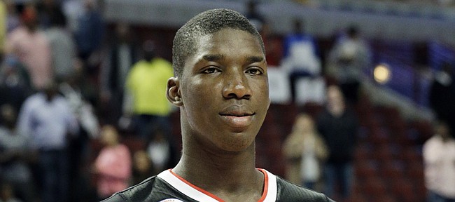 East forward Cheick Diallo of Our Savior New American in Centereach, NY., holds the MVP trophy after East defeated West 111-91 in the McDonald's All-American boys basketball game in Chicago on Wednesday, April 1, 2015. (AP Photo/Nam Y. Huh)