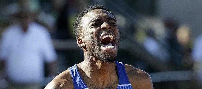 Kansas University’s Michael Stigler celebrates after winning the 400-meter hurdles during the NCAA Outdoor Track and Field Championships on Friday in Eugene, Oregon.