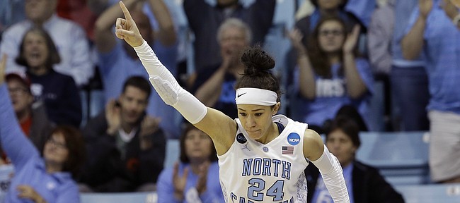 North Carolina's Jessica Washington (24) reacts following a basket against Liberty during the first half of a women's college basketball game in the first round of the NCAA tournament in Chapel Hill, N.C., Saturday, March 21, 2015. North Carolina won 71-65. (AP Photo/Gerry Broome)
