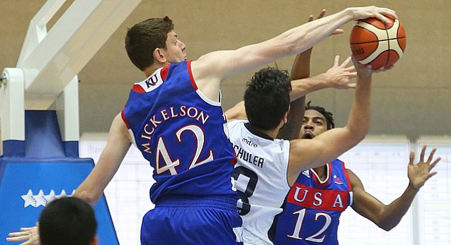 Kansas center Hunter Mickelson (42) blocks a shot by Chilean guard Fernando Schuler (13) with Team USA guard Julian DeBose (12) also defending in a Team USA game against Chile Tuesday, July 7, at the World University Games in South Korea.