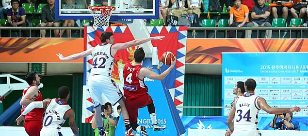 Kansas center Hunter Mickelson (42) reaches to block a shot by Serbia guard Stefan Pot (4) in a Team USA 66-65 win against Serbia Wednesday, July 8, at the World University Games in South Korea.