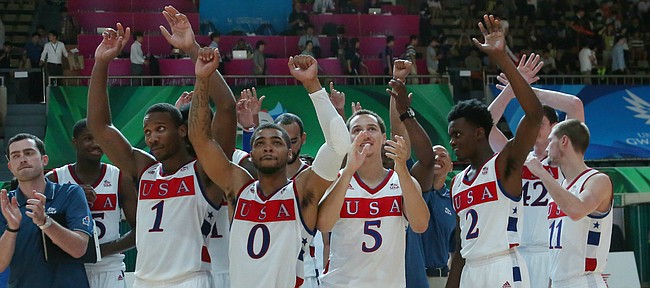 Team USA players acknowledge the crowd after a 66-65 win against Serbia Wednesday, July 8, at the World University Games in South Korea.