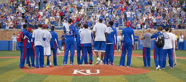 Members of the Kansas University basketball team, who won a gold medal representing Team USA during the recent World University games in South Korea are given a standing ovation as they are welcomed home during a ceremony Wednesday, July 15, 2015 at Hoglund Ballpark.