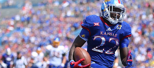 Kansas running back Ke'aun Kinner (22) makes his way in for a touchdown during the third quarter on Saturday, Sept. 5, 2015 at Memorial Stadium.
