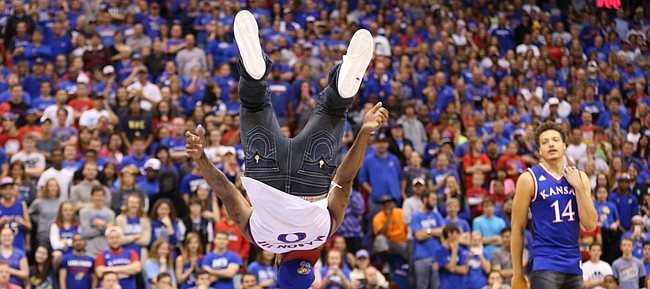 Kansas University guard Frank Mason flips before the Allen Fieldhouse crowd in this photo from last year’s Late Night in the Phog on Oct. 10, 2014. This year’s Late Night will be Friday.