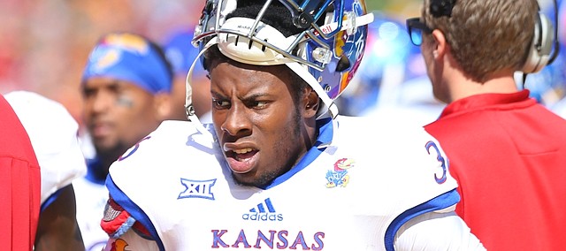 Kansas cornerback Chevy Graham (36) shows his frustration on the sideline as the Jayhawks are forced to punt during the third quarter on Saturday, Oct. 3, 2015 at Jack Trice Stadium in Ames, Iowa.