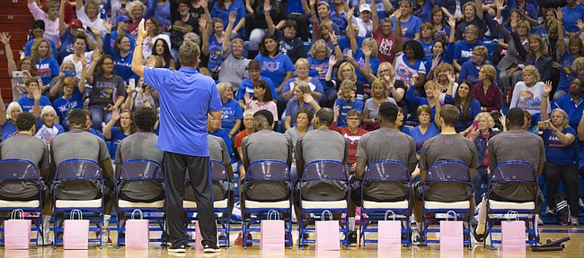 Kansas head coach Bill Self gets a healthy show of hands after asking if there are any returning members in the crowd who have been to Ladies Night Out before, Thursday, Oct. 22, 2015 at Allen Fieldhouse.