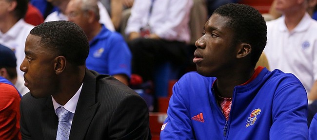 Kansas forward Cheick Diallo watches from the bench during the second half on Wednesday, Nov. 4, 2015 at Allen Fieldhouse. Diallo has yet to be cleared the NCAA.