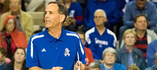 Kansas University Volleyball coach Ray Bechard signals to his team against West Virgina on Oct. 3 at the Horejsi Center. On Monday Bechard, who led the Jayhawks to a 26-2 record and No. 9 national ranking, was named Big 12 Coach of the Year.