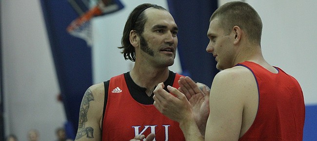 Former Jayhawks Scot Pollard, left, and Cole Aldrich scrimmaged against KU's current team at Bill Self's basketball bamp on Wednesday, June 15, 2011.