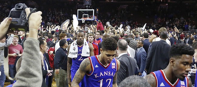 Kansas players leave the court after the Jayhawk's 77-52 loss to the Temple Owls Monday at the Wells Fargo Center in Philadelphia, PA. In the foreground from center are Cliff Alexander (2) Kelly Oubre, Jr. (12) and Jamari Traylor (31).