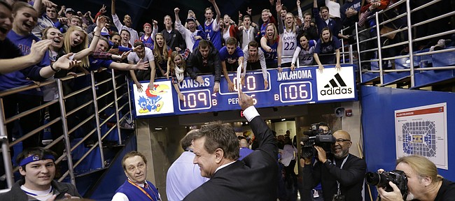 Kansas head coach Bill Self flashes a smile as he leaves the court following the Jayhawks' 109-106 triple overtime win over the Sooners.