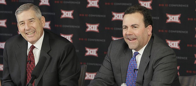 Big 12 commissioner Bob Bowlsby, left, and Kansas athletic director Sheahon Zenger laugh while taking reporter's questions after the first day of the conference's meeting Thursday, Feb. 4, 2016, in Irving, Texas. (AP Photo/LM Otero)