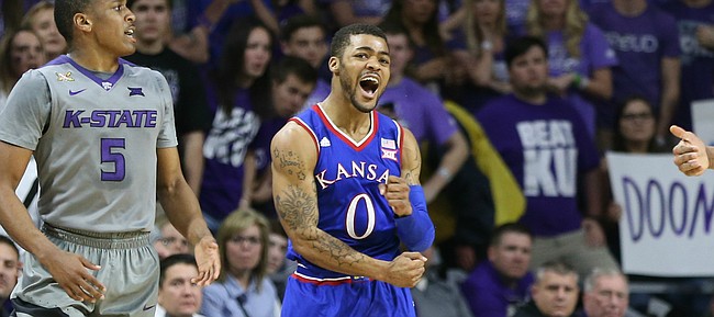 Kansas guard Frank Mason III (0) celebrates after disrupting a pass from Kansas State guard Barry Brown (5) to forward Stephen Hurt (41) for a turnover by the Wildcats during the first half, Saturday, Feb. 20, 2016 at Bramlage Coliseum in Manhattan, Kan.
