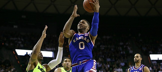Kansas guard Frank Mason III (0) gets to the bucket past Baylor guard Lester Medford (11) during the second half, Tuesday, Feb. 23, 2016 at Ferrell Center in Waco, Texas.