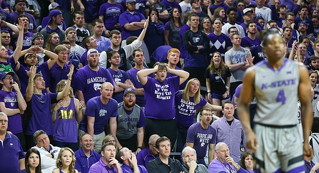 Kansas State fans watch with disbelief after the Wildcats are whistled for a foul during the first half, Saturday, Feb. 20, 2016 at Bramlage Coliseum in Manhattan, Kan.