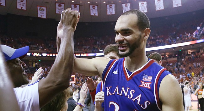 Kansas forward Perry Ellis greets fans as he exits the court after an 86-56 win over the Longhorns Monday, Feb. 29, 2016 at the Frank Erwin Center in Austin, Texas. 
