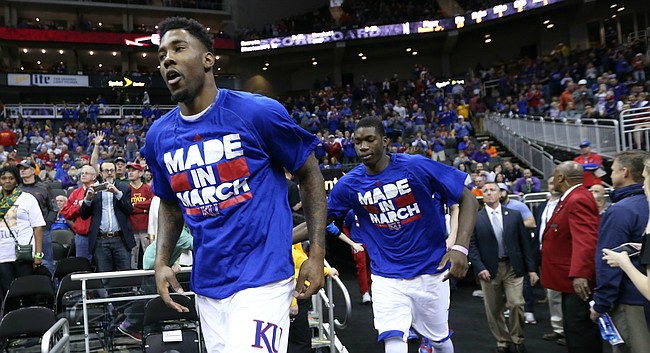 Kansas forward Jamari Traylor, forward Cheick Diallo and the rest of the Jayhawks take the court for warmups, Thursday, March 10, 2016 at Sprint Center in Kansas City, Mo.