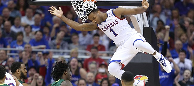 Kansas guard Wayne Selden Jr. (1) comes down after going baseline for a dunk during the second half, Friday, March 11, 2016 at Sprint Center in Kansas City, Mo.