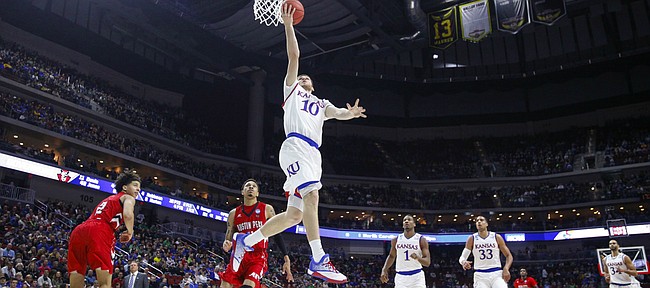Kansas guard Sviatoslav Mykhailiuk (10) floats in for a bucket against Austin Peay during the second half, Thursday, March 17, 2016 at Wells Fargo Arena in Des Moines, Iowa.