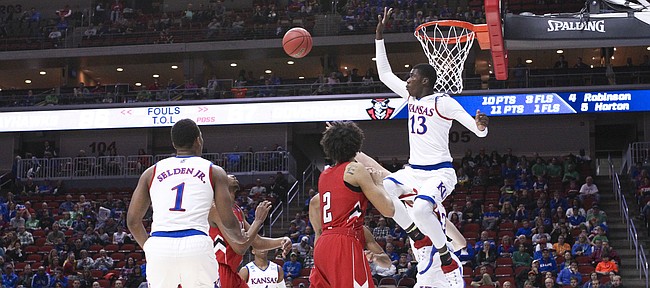 Kansas forward Cheick Diallo (13) gets up to reject a shot during the second half, Thursday, March 17, 2016 at Wells Fargo Arena in Des Moines, Iowa.